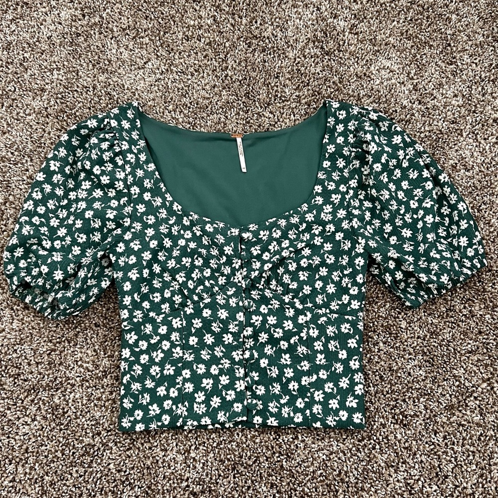 Free People floral top. Size XS. Gently used.